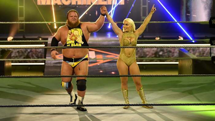 WWE's Mandy Rose and Otis celebrate in the ring at WrestleMania 36